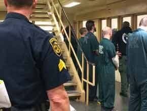 Inmates Facing Window Near To Stairs