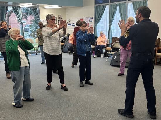 Officer Teaching Seniors Safety